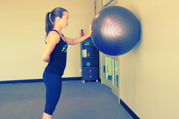 One-Handed Swiss Ball Wall Push-Up