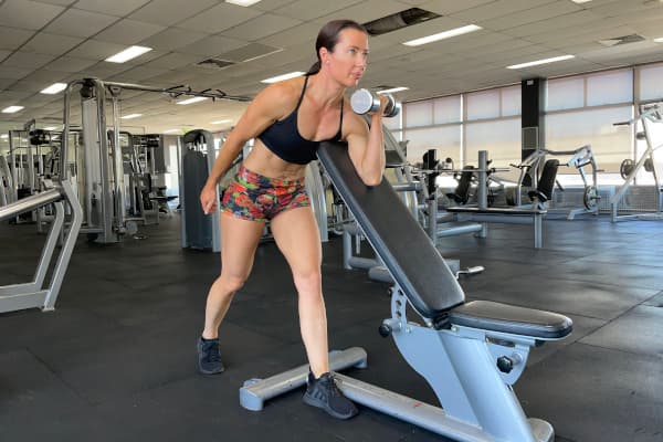 Standing Single Arm Dumbbell Curl Over Incline Bench