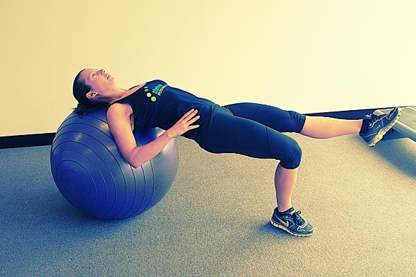 Swiss Ball Bent Knee Bridge With Leg Lifts